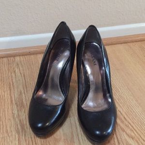 Black Alfani high heels size 5.
